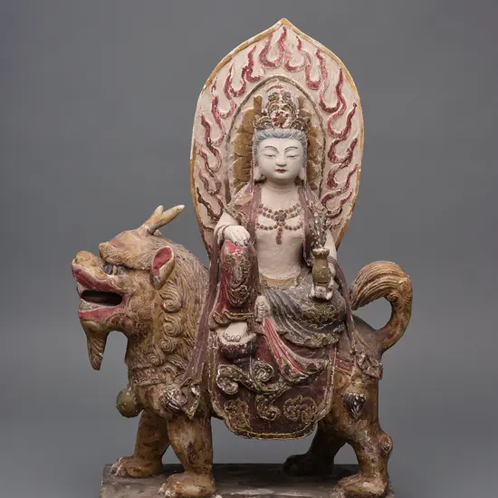 Chinese wood and gesso Buddha figure seated on mythological lion dog,
